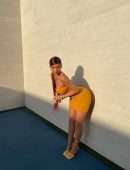 Kylie Jenner in a Yellow Tight Dress