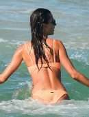 Alessandra Ambrosio in Orange Bikini on the Beach in Florianopolis