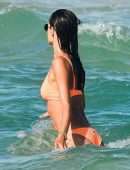 Alessandra Ambrosio in Orange Bikini on the Beach in Florianopolis