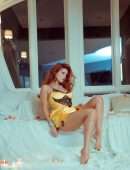 Bella Thorne Leggy and Cleavage in a Sheer Lingerie