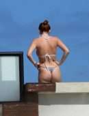 Bella Thorne Cleavage and Booty in a Tiny Thong Bikini in Tulum