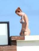 Bella Thorne Cleavage and Booty in a Tiny Thong Bikini in Tulum