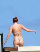 Bella Thorne Cleavage and Booty in a Tiny Thong Bikini in Tulum
