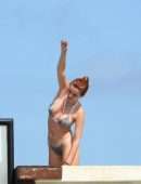 Bella Thorne Cleavage and Booty in a Tiny Thong Bikini in Tulum