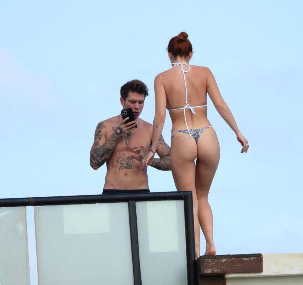 Bella Thorne Cleavage and Booty in a Tiny Thong Bikini in Tulum
