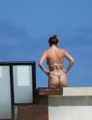 Bella Thorne Cleavage and Booty in a Tiny Thong Bikini in Tulum