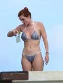 Bella Thorne Cleavage and Booty in a Tiny Thong Bikini in Tulum