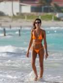 Izabel Goulart Booty in Orange Bikini on the Beach in St. Barts