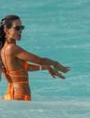 Izabel Goulart Booty in Orange Bikini on the Beach in St. Barts