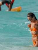 Izabel Goulart Booty in Orange Bikini on the Beach in St. Barts