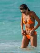 Izabel Goulart Booty in Orange Bikini on the Beach in St. Barts