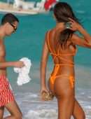 Izabel Goulart Booty in Orange Bikini on the Beach in St. Barts