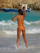 Izabel Goulart Booty in Orange Bikini on the Beach in St. Barts