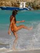 Izabel Goulart Booty in Orange Bikini on the Beach in St. Barts