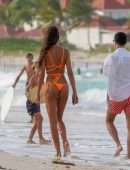 Izabel Goulart Booty in Orange Bikini on the Beach in St. Barts
