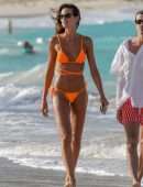 Izabel Goulart Booty in Orange Bikini on the Beach in St. Barts