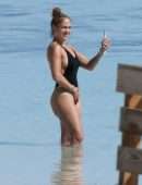 Jennifer Lopez Booty in a Black Swimsuit on the Beach in Turks and Caicos
