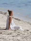 Jennifer Lopez Booty in a Black Swimsuit on the Beach in Turks and Caicos
