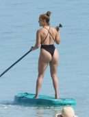 Jennifer Lopez Booty in a Black Swimsuit on the Beach in Turks and Caicos
