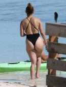 Jennifer Lopez Booty in a Black Swimsuit on the Beach in Turks and Caicos
