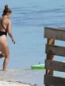 Jennifer Lopez Booty in a Black Swimsuit on the Beach in Turks and Caicos