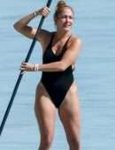 Jennifer Lopez Booty in a Black Swimsuit on the Beach in Turks and Caicos
