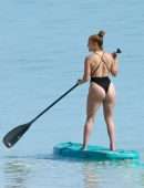 Jennifer Lopez Booty in a Black Swimsuit on the Beach in Turks and Caicos