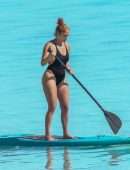 Jennifer Lopez Booty in a Black Swimsuit on the Beach in Turks and Caicos