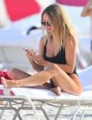 Kimberley Garner Booty in a Black Swimsuit at a Beach in Miami