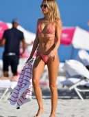 Kimberley Garner in a Tiny Pink String Bikini on the Beach in Miami
