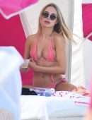 Kimberley Garner in a Tiny Pink String Bikini on the Beach in Miami