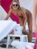 Kimberley Garner in a Tiny Pink String Bikini on the Beach in Miami