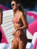 Kimberley Garner in a Tiny Pink String Bikini on the Beach in Miami