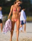 Kimberley Garner in a Tiny Pink String Bikini on the Beach in Miami