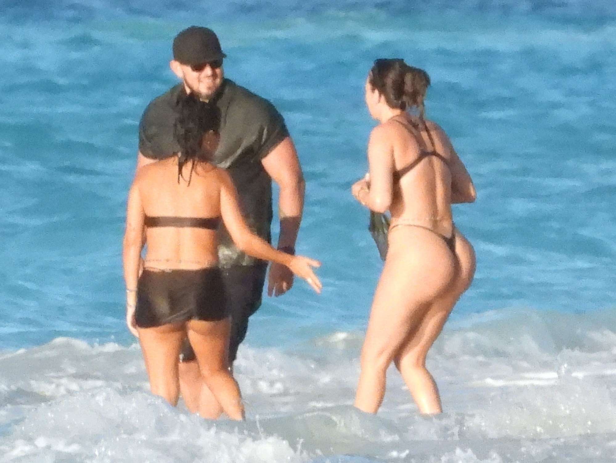 Kourtney Kardashian and Kim Kardashian Seen at a Beach in Turks and Caico