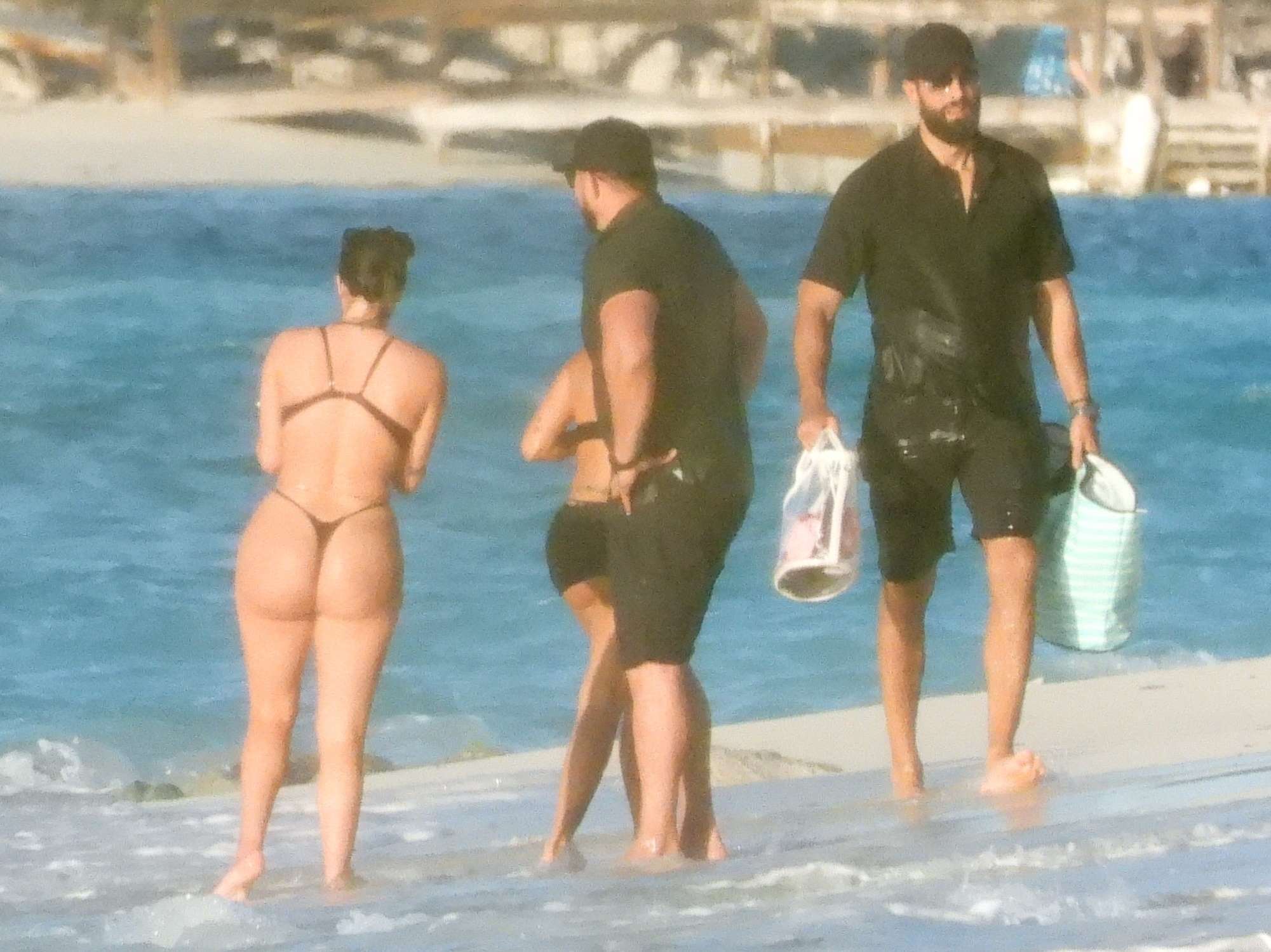 Kourtney Kardashian and Kim Kardashian Seen at a Beach in Turks and Caico