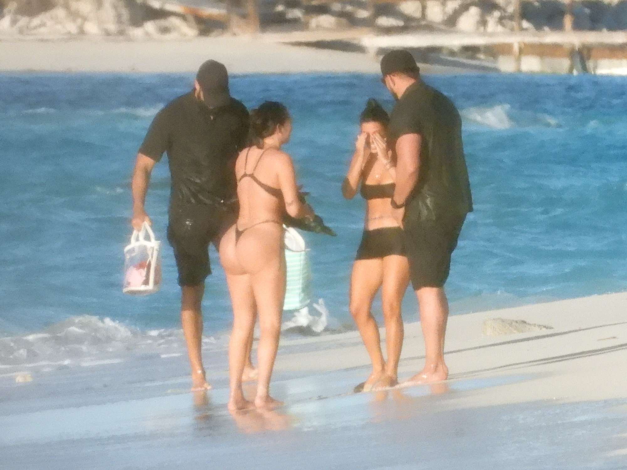 Kourtney Kardashian and Kim Kardashian Seen at a Beach in Turks and Caico