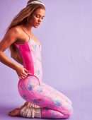 Nina Agdal Booty in Loveshack Fancy x Beach Riot Activewear Collection