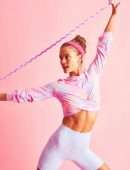 Nina Agdal Booty in Loveshack Fancy x Beach Riot Activewear Collection