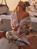 Alexis Ren Braless in a Sunset Photoshoot on a Scooter