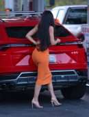 Kylie Jenner Booty in Tight Orange Dress at a Gas Station in Bel Air