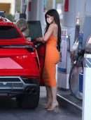 Kylie Jenner Booty in Tight Orange Dress at a Gas Station in Bel Air