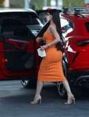 Kylie Jenner Booty in Tight Orange Dress at a Gas Station in Bel Air