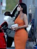 Kylie Jenner Booty in Tight Orange Dress at a Gas Station in Bel Air