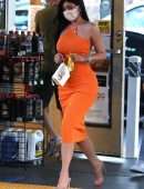 Kylie Jenner Booty in Tight Orange Dress at a Gas Station in Bel Air