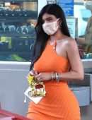 Kylie Jenner Booty in Tight Orange Dress at a Gas Station in Bel Air