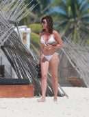 Luann de Lesseps Booty at the Beach in a White Bikini in Tulum, Mexico