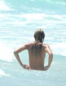Candice Swanepoel in the Sea on a Beach in Tulum