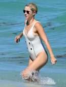 Claire Holt in One-piece Swimsuit as she takes a Dip in the Ocean in Miami