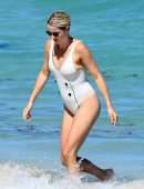 Claire Holt in One-piece Swimsuit as she takes a Dip in the Ocean in Miami